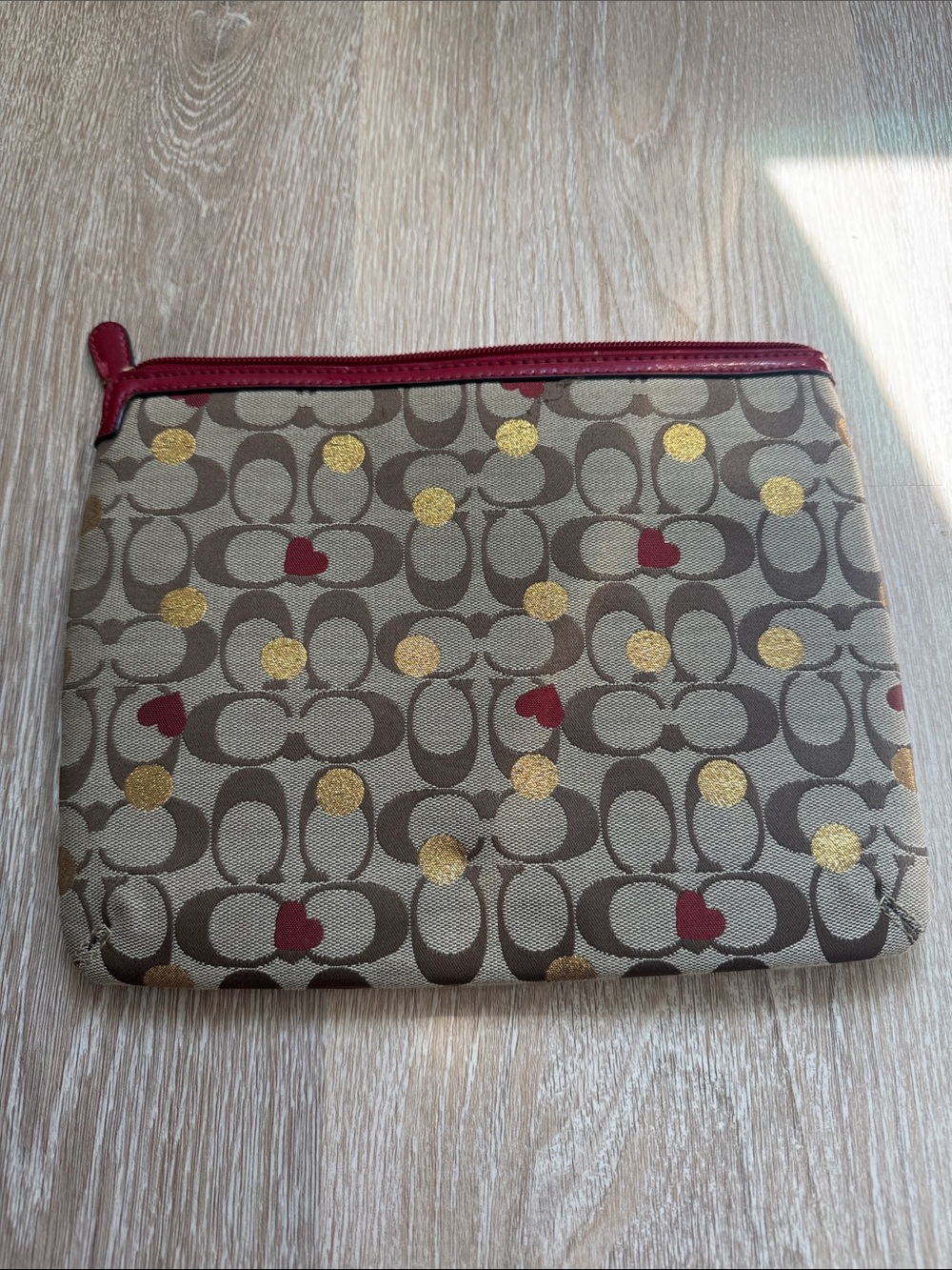 Coach Beige Signature Canvas Wristlet with Red Trim and Gold Accents